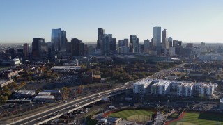DX0001_001638 - 5.7K aerial stock footage flyby the city skyline at sunrise in Downtown Denver, Colorado
