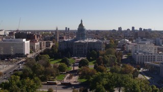 DX0001_001692 - 5.7K aerial stock footage of a view of the Colorado State Capitol building, seen from the park, Downtown Denver, Colorado