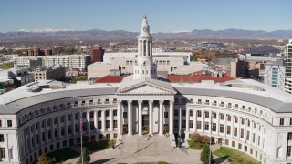 DX0001_001693 - 5.7K aerial stock footage of flying by the Denver City Council building, Downtown Denver, Colorado