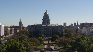 DX0001_001706 - 5.7K aerial stock footage of passing by the Colorado State Capitol during ascent, Downtown Denver, Colorado