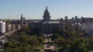 DX0001_001709 - 5.7K aerial stock footage flyby the Colorado State Capitol during during descent toward trees, Downtown Denver, Colorado