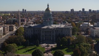 DX0001_001713 - 5.7K aerial stock footage fly away from the Colorado State Capitol during descent, Downtown Denver, Colorado