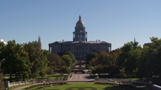 DX0001_001714 - 5.7K aerial stock footage ascending toward the Colorado State Capitol from park, Downtown Denver, Colorado