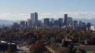 DX0001_001747 - 5.7K aerial stock footage of focusing on the city's skyline, revealing a clock tower, Downtown Denver, Colorado