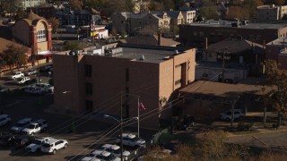 DX0001_001763 - 5.7K aerial stock footage of a brick police station in Denver, Colorado