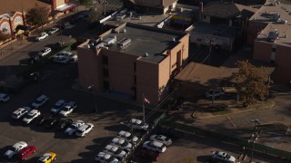 DX0001_001766 - 5.7K aerial stock footage approach and flyby a brick police station in Denver, Colorado