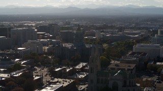 DX0001_001778 - 5.7K aerial stock footage flyby Colorado State Capitol, Denver City Council and cathedral in Downtown Denver, Colorado