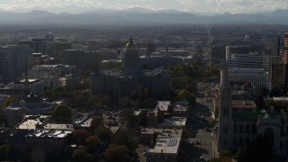 DX0001_001780 - 5.7K aerial stock footage of Colorado State Capitol, Denver City Council and cathedral while descending in Downtown Denver, Colorado
