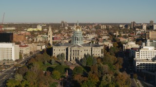 DX0001_001787 - 5.7K aerial stock footage slowly ascend to view the Colorado State Capitol and tree-lined park in Downtown Denver, Colorado