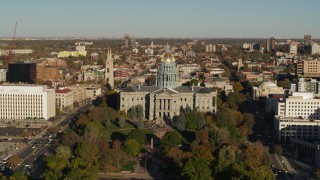 DX0001_001788 - 5.7K aerial stock footage reverse and flyby the Colorado State Capitol and tree-lined park in Downtown Denver, Colorado