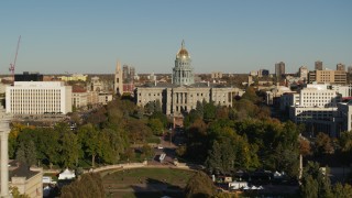 DX0001_001794 - 5.7K aerial stock footage of the Colorado State Capitol, reveal clock tower in Downtown Denver, Colorado