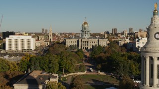 DX0001_001795 - 5.7K aerial stock footage passing the Colorado State Capitol, reveal clock tower in Downtown Denver, Colorado