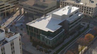 DX0001_001800 - 5.7K aerial stock footage of orbiting a police crime lab in Downtown Denver, Colorado