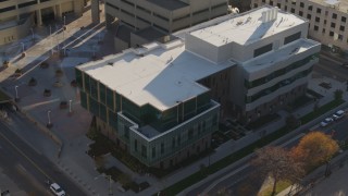 DX0001_001801 - 5.7K aerial stock footage of an orbit of a police crime lab in Downtown Denver, Colorado