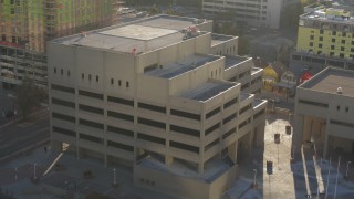 DX0001_001804 - 5.7K aerial stock footage of orbiting the side of a police headquarters in Downtown Denver, Colorado