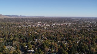 DX0001_001894 - 5.7K aerial stock footage of a wide view of Boulder, Colorado and surrounding neighborhoods while descending