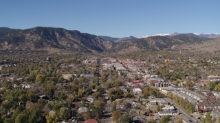 DX0001_001917 - 5.7K aerial stock footage a slow approach to Boulder, Colorado with mountains in background