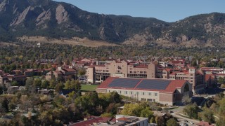 DX0001_001947 - 5.7K aerial stock footage ascend for view of campus buildings at the University of Colorado Boulder