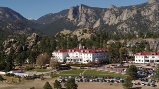 DX0001_001963 - 5.7K aerial stock footage ascend and flyby the historic Stanley Hotel in Estes Park, Colorado