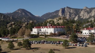 DX0001_001965 - 5.7K aerial stock footage descend and flyby the historic Stanley Hotel in Estes Park, Colorado