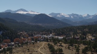 DX0001_001968 - 5.7K aerial stock footage of the Rocky Mountains seen from the town of Estes Park, Colorado