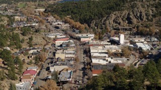 DX0001_001985 - 5.7K aerial stock footage of shops lining the road through Estes Park, Colorado