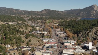 DX0001_001996 - 5.7K aerial stock footage flyby shops lining road through Estes Park, Colorado while descending