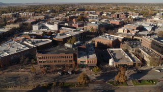 DX0001_002015 - 5.7K aerial stock footage a view of brick office buildings and shops in Fort Collins, Colorado