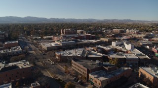 DX0001_002026 - 5.7K aerial stock footage approaching shops and office buildings in Fort Collins, Colorado