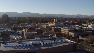 DX0001_002034 - 5.7K aerial stock footage reverse view and flyby a brick office buildings and shops in Fort Collins, Colorado