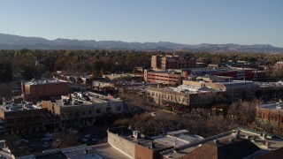 DX0001_002035 - 5.7K aerial stock footage approach office buildings and shops in Fort Collins, Colorado