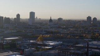 DX0001_002088 - 5.7K aerial stock footage of a domed cathedral at sunrise in Downtown Minneapolis, Minnesota