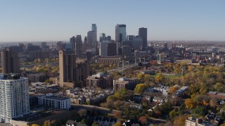 DX0001_002112 - 5.7K aerial stock footage of a view of city's skyline at sunrise in Downtown Minneapolis, Minnesota