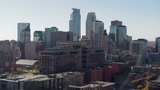 DX0001_002160 - 5.7K aerial stock footage flyby office building and city's skyline, Downtown Minneapolis, Minnesota