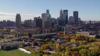 DX0001_002367 - 5.7K aerial stock footage descend with view of the city's skyline and Mississippi River, Downtown Minneapolis, Minnesota