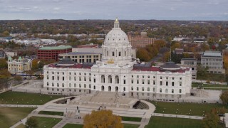 DX0001_002396 - 5.7K aerial stock footage of the Minnesota State Capitol in Saint Paul, Minnesota as people walk through park