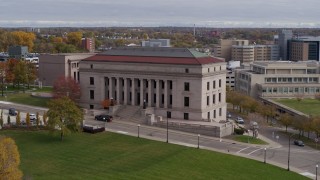 DX0001_002412 - 5.7K aerial stock footage fly away from the front of the Minnesota Judicial Center courthouse building in Saint Paul, Minnesota
