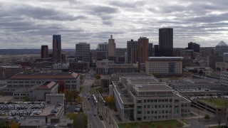 DX0001_002434 - 5.7K aerial stock footage of ascending and flying by the city skyline, Downtown Saint Paul, Minnesota