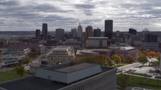 DX0001_002435 - 5.7K aerial stock footage of flying by courthouse with view of the city skyline, Downtown Saint Paul, Minnesota