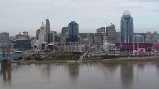 DX0001_002619 - 5.7K aerial stock footage flyby a riverfront baseball stadium and skyline, Downtown Cincinnati, Ohio