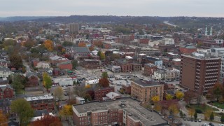 DX0001_002665 - 5.7K aerial stock footage of flying by brick buildings in downtown in Covington, Kentucky
