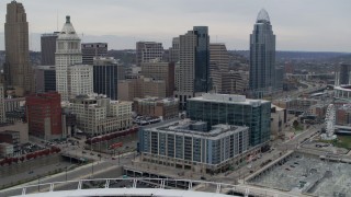 DX0001_002675 - 5.7K stock footage aerial video flyby apartment and office buildings near tall skyscrapers in Downtown Cincinnati, Ohio