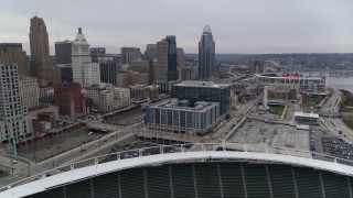 DX0001_002680 - 5.7K aerial stock footage of apartment and office buildings near skyscrapers seen from the football stadium in Downtown Cincinnati, Ohio