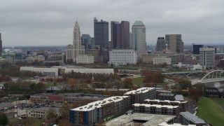 DX0001_002694 - 5.7K aerial stock footage of passing by the city's skyline, reveal Scioto River in Downtown Columbus, Ohio
