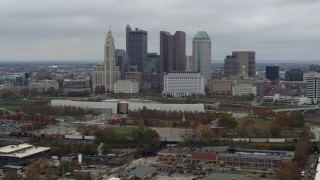 DX0001_002696 - 5.7K aerial stock footage ascend for view of skyscrapers in skyline in Downtown Columbus, Ohio