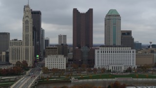 DX0001_002705 - 5.7K aerial stock footage passing by four tall skyscrapers in the city's skyline in Downtown Columbus, Ohio