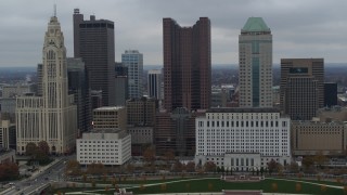 DX0001_002706 - 5.7K aerial stock footage slowly passing by four tall skyscrapers in the city's skyline in Downtown Columbus, Ohio