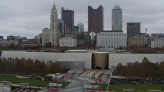 DX0001_002727 - 5.7K aerial stock footage flying by the science museum, with city's skyline behind it, Downtown Columbus, Ohio