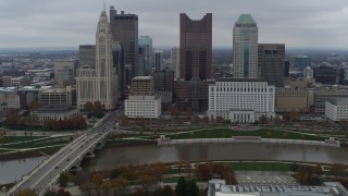 DX0001_002730 - 5.7K aerial stock footage flyby the city's skyline and river near Discovery Bridge, Downtown Columbus, Ohio