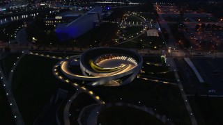 DX0001_002778 - 5.7K aerial stock footage of a stationary view of the Veterans Memorial Auditorium at twilight in Columbus, Ohio